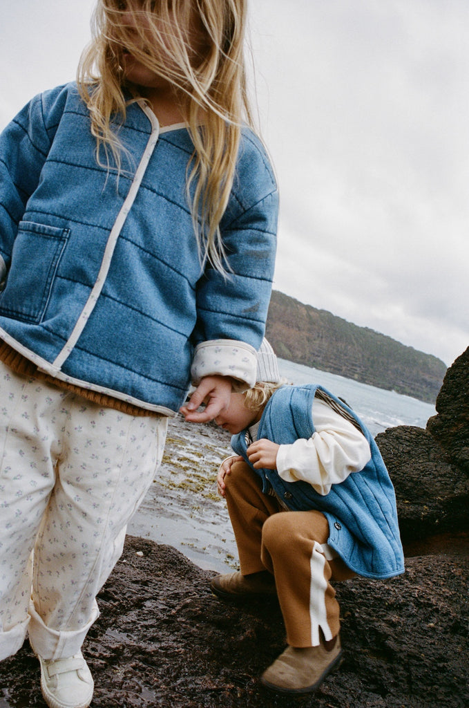Organic cotton denim quilted jacket with reversible floral lining. designed for children