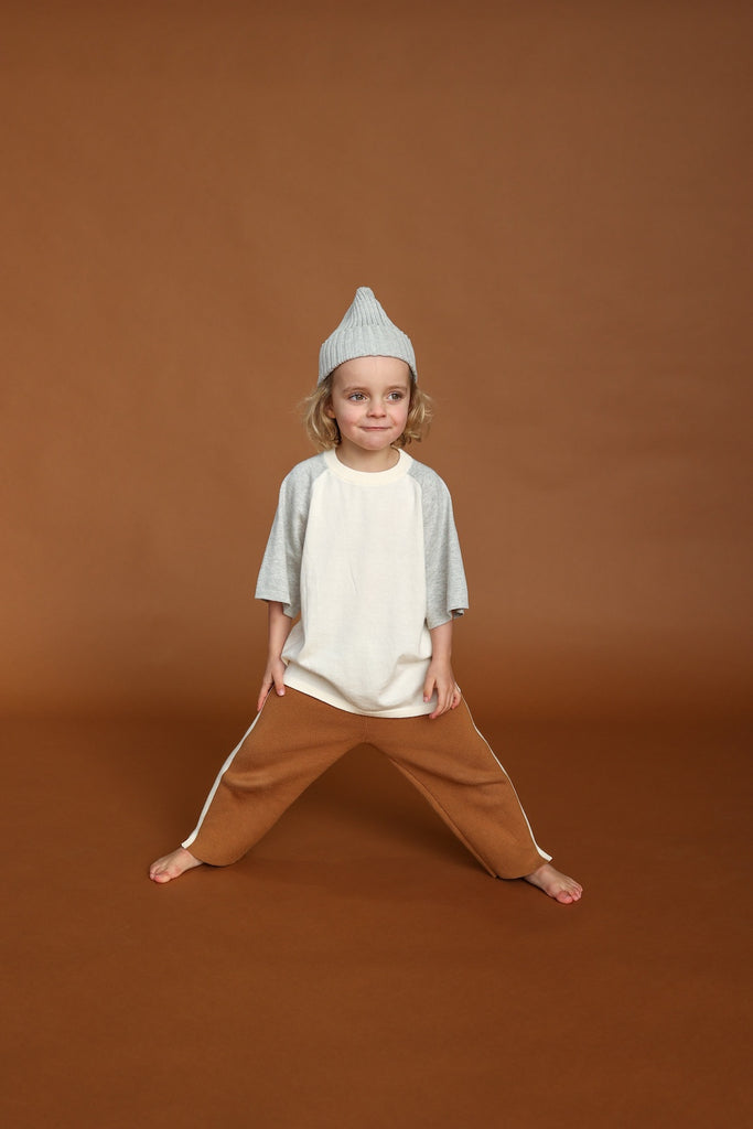 Gray and white tee for children. knitted from organic cotton with brown knitted pant